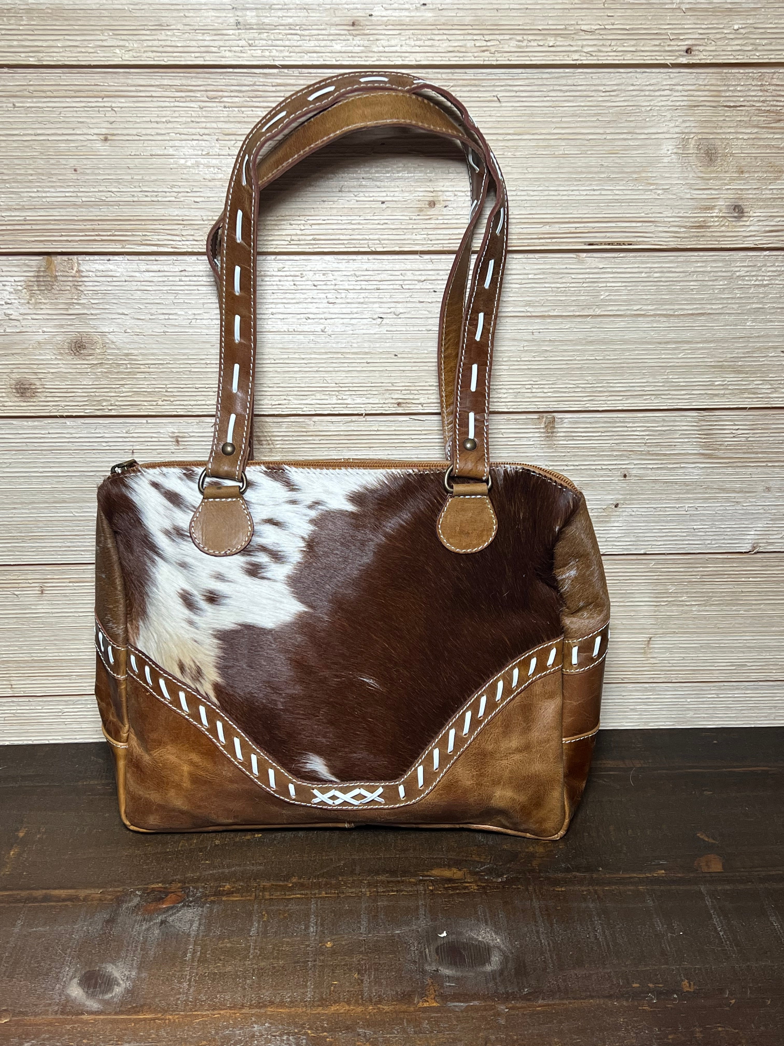 Cowhide best sale purse boutique